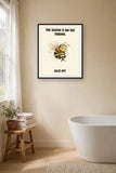 The smug bee print in a black frame hanging on a bathroom wall beside a freestanding tub — frame for display only, not included