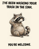 Raccoon watercolor art print with the saying "I'VE BEEN WASHING YOUR TRASH IN THE SINK. YOU'RE WELCOME."