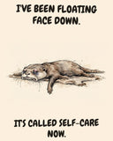 Otter watercolor art print with the saying "I'VE BEEN FLOATING FACE DOWN. IT'S CALLED SELF-CARE NOW."