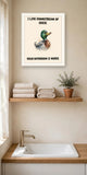 The same print shown hanging in a bathroom — frame for display only, not included