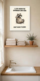 The same print shown hanging in a bathroom — frame for display only, not included