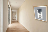 The same wordless print shown hanging on a wall — frame for display only, not included