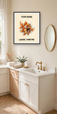 The same print shown hanging in a bathroom — frame for display only, not included
