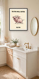The same print shown hanging in a bathroom — frame for display only, not included