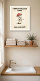 The same print shown hanging in a bathroom — frame for display only, not included