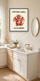 The same print shown hanging in a bathroom — frame for display only, not included
