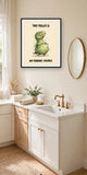 The same print shown hanging in a bathroom — frame for display only, not included
