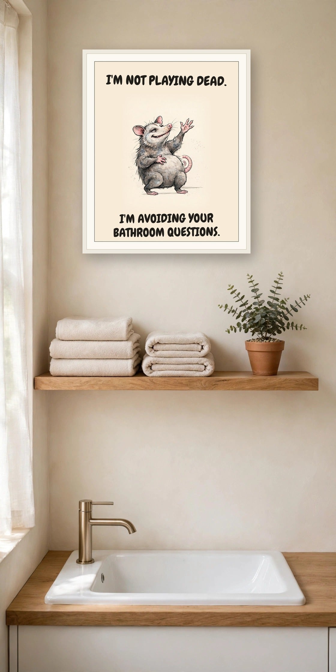 The same print shown hanging in a bathroom — frame for display only, not included