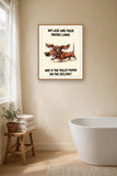 The same print shown hanging in a bathroom — frame for display only, not included