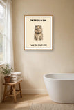 The same print shown hanging in a bathroom — frame for display only, not included