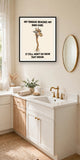 The same print shown hanging in a bathroom — frame for display only, not included