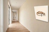 The same wordless print shown hanging on a wall — frame for display only, not included