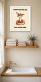 The same print shown hanging in a bathroom — frame for display only, not included