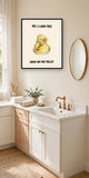 The same print shown hanging in a bathroom — frame for display only, not included