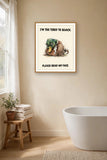 The same print shown hanging in a bathroom — frame for display only, not included
