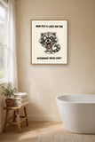 The same print shown hanging in a bathroom — frame for display only, not included