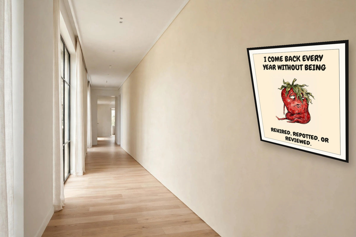 The same print shown hanging in an office — frame for display only, not included