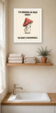 The same print shown hanging in a bathroom — frame for display only, not included