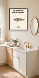 The same print shown hanging in a bathroom — frame for display only, not included