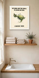 The same print shown hanging in a bathroom — frame for display only, not included