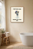 The same print shown hanging in a bathroom — frame for display only, not included