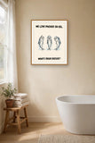 The same print shown hanging in a bathroom — frame for display only, not included