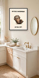 The same print shown hanging in a bathroom — frame for display only, not included