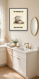 The same print shown hanging in a bathroom — frame for display only, not included