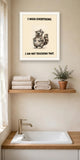 The same print shown hanging in a bathroom — frame for display only, not included
