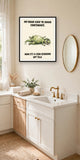 The same print shown hanging in a bathroom — frame for display only, not included
