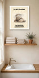 The same print shown hanging in a bathroom — frame for display only, not included