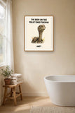 The same print shown hanging in a bathroom — frame for display only, not included