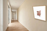 The same wordless print shown hanging on a wall — frame for display only, not included