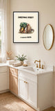 The same print shown hanging on a wall — frame for display only, not included