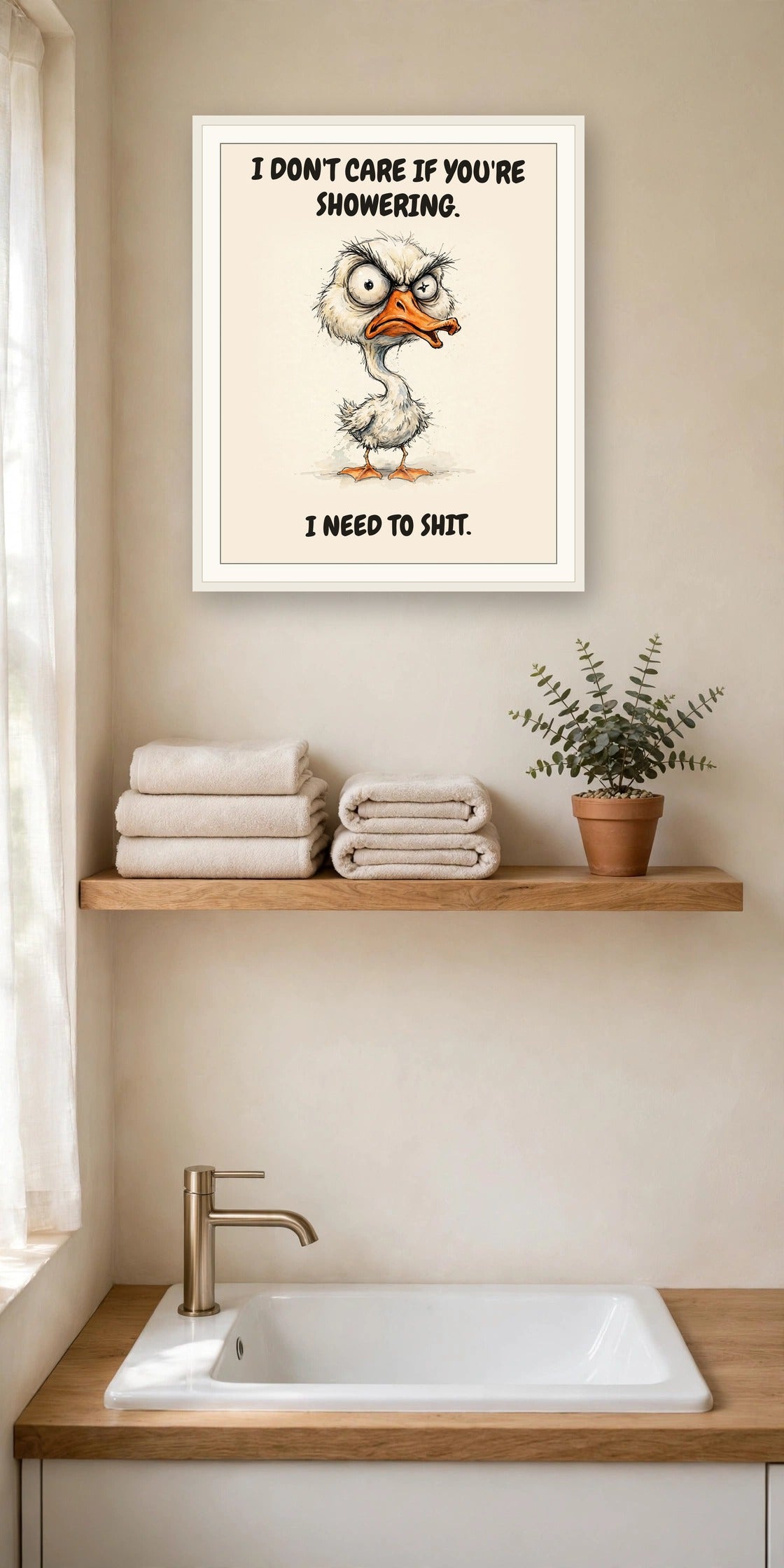 The same print shown hanging in a bathroom — frame for display only, not included