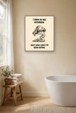 The same print shown hanging in a bathroom — frame for display only, not included