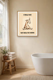 The same print shown hanging in a bathroom — frame for display only, not included