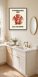 The same print shown hanging in a bathroom — frame for display only, not included