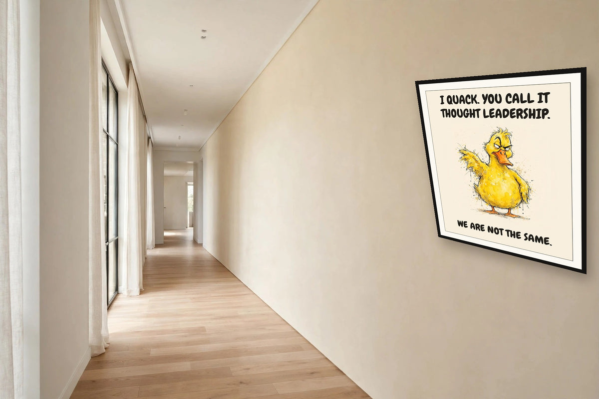 The same print shown hanging in an office — frame for display only, not included