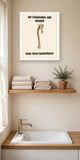 The same print shown hanging in a bathroom — frame for display only, not included