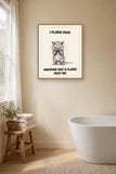 The same print shown hanging in a bathroom — frame for display only, not included