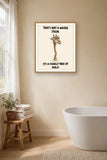 The same print shown hanging in a bathroom — frame for display only, not included