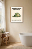 The same print shown hanging in a bathroom — frame for display only, not included