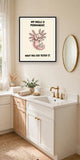 The same print shown hanging in a bathroom — frame for display only, not included