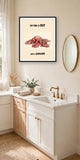 The same print shown hanging on a wall — frame for display only, not included