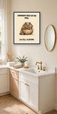 The same print shown hanging in a bathroom — frame for display only, not included