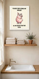 The same print shown hanging in a bathroom — frame for display only, not included