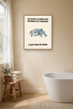 The same print shown hanging in a bathroom — frame for display only, not included