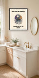The same print shown hanging in a bathroom — frame for display only, not included