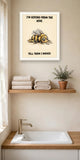 The same print shown hanging in a bathroom — frame for display only, not included